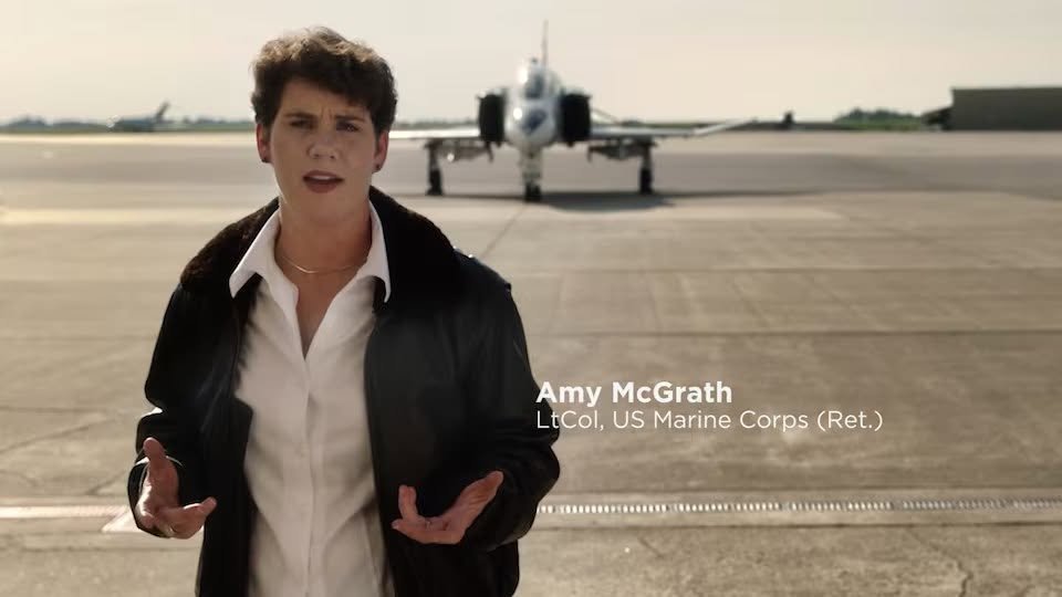 Amy McGrath on the Madison County Airport runway during campaign ad filming